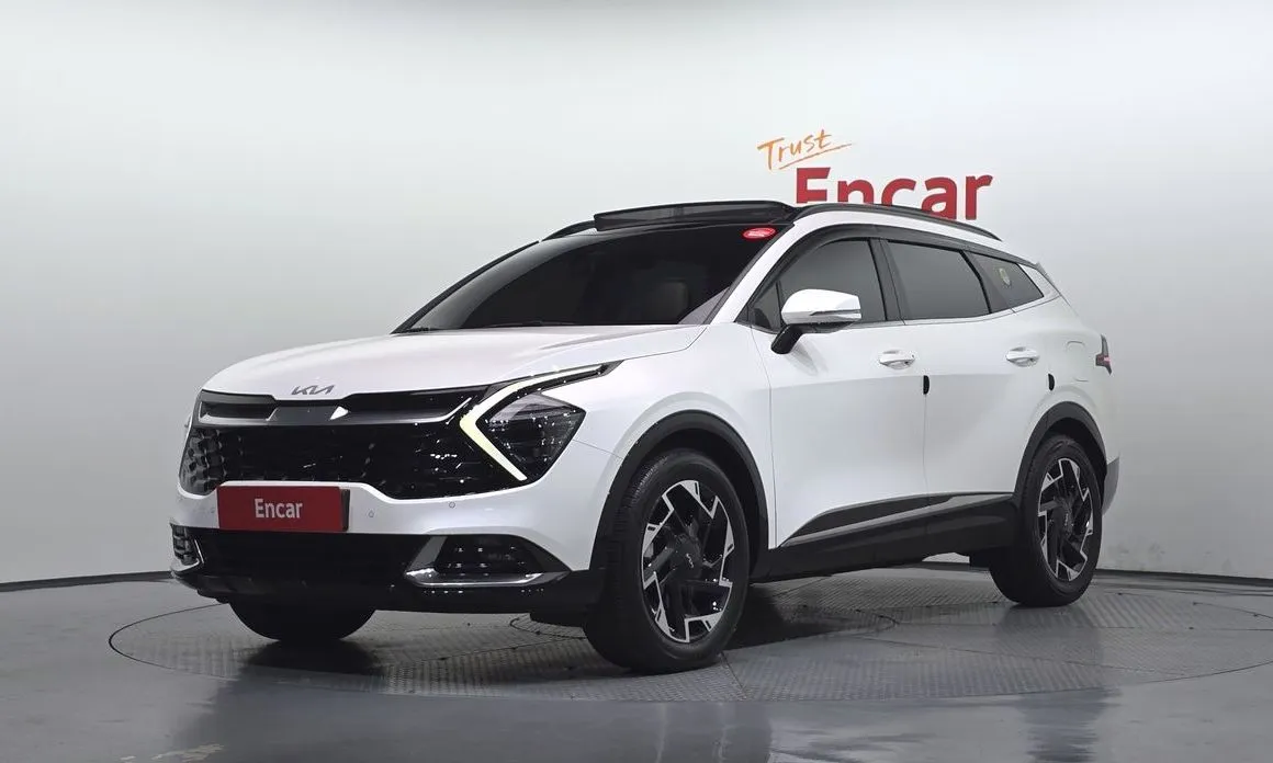 Kia Sportage — фото 1