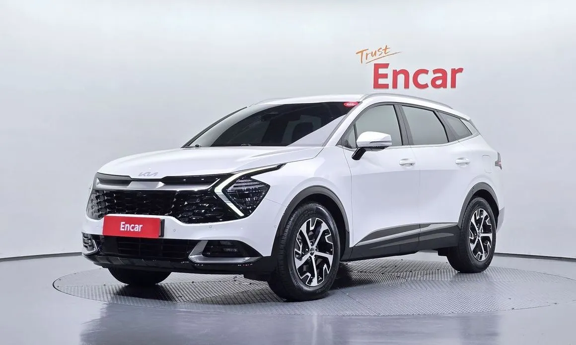 Kia Sportage — фото 1