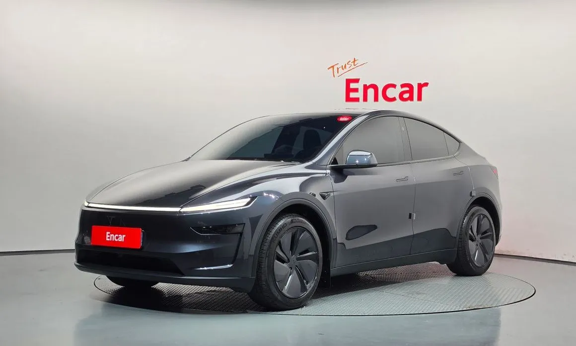 Tesla Model Y — фото 1
