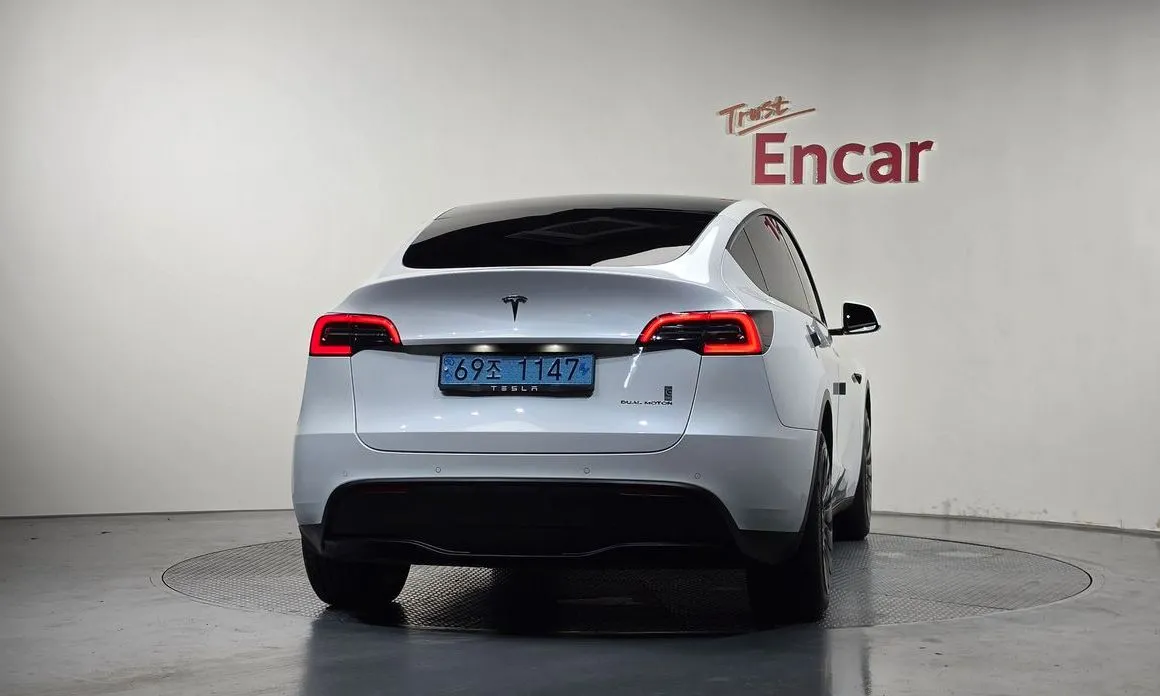 Tesla Model Y — фото 9