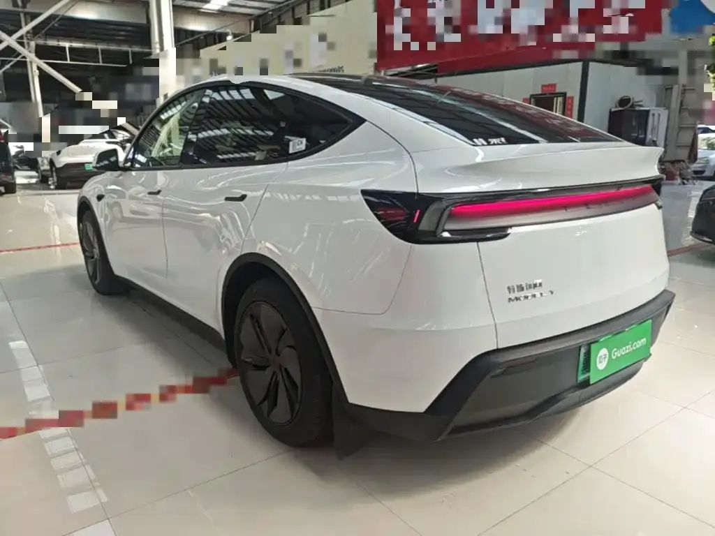 Tesla Model Y — фото 7