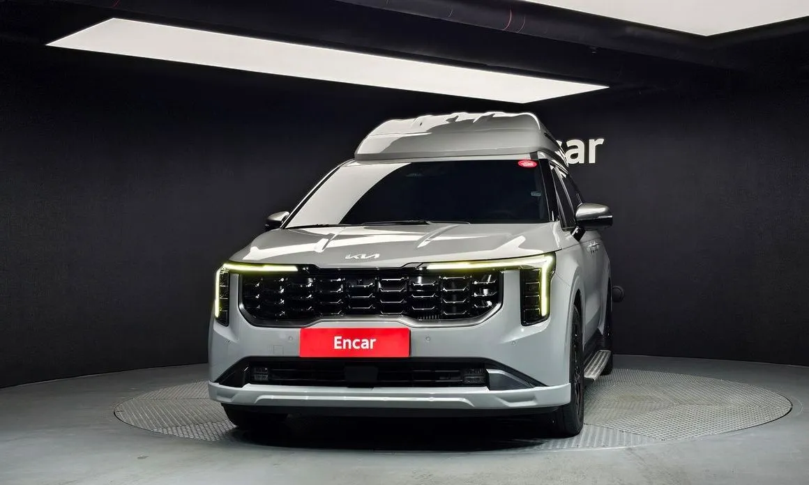 Kia Carnival — фото 10