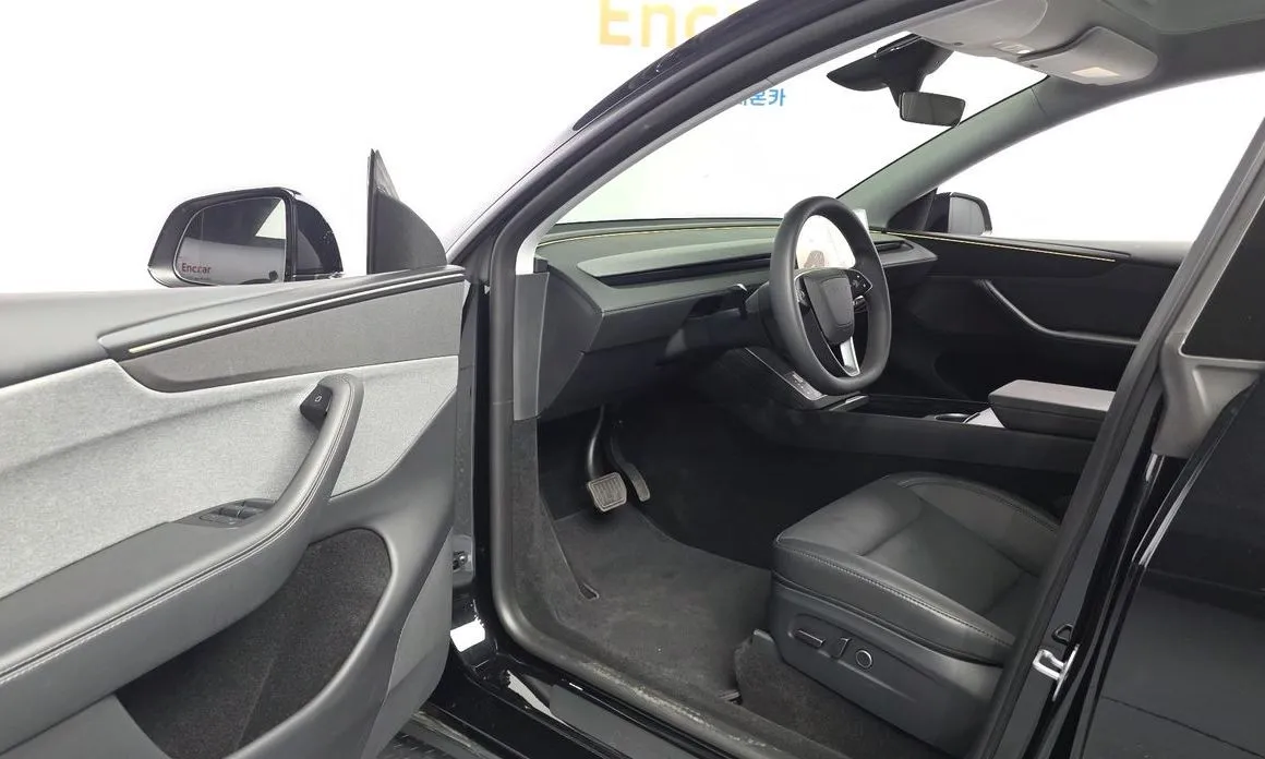 Tesla Model Y — фото 9