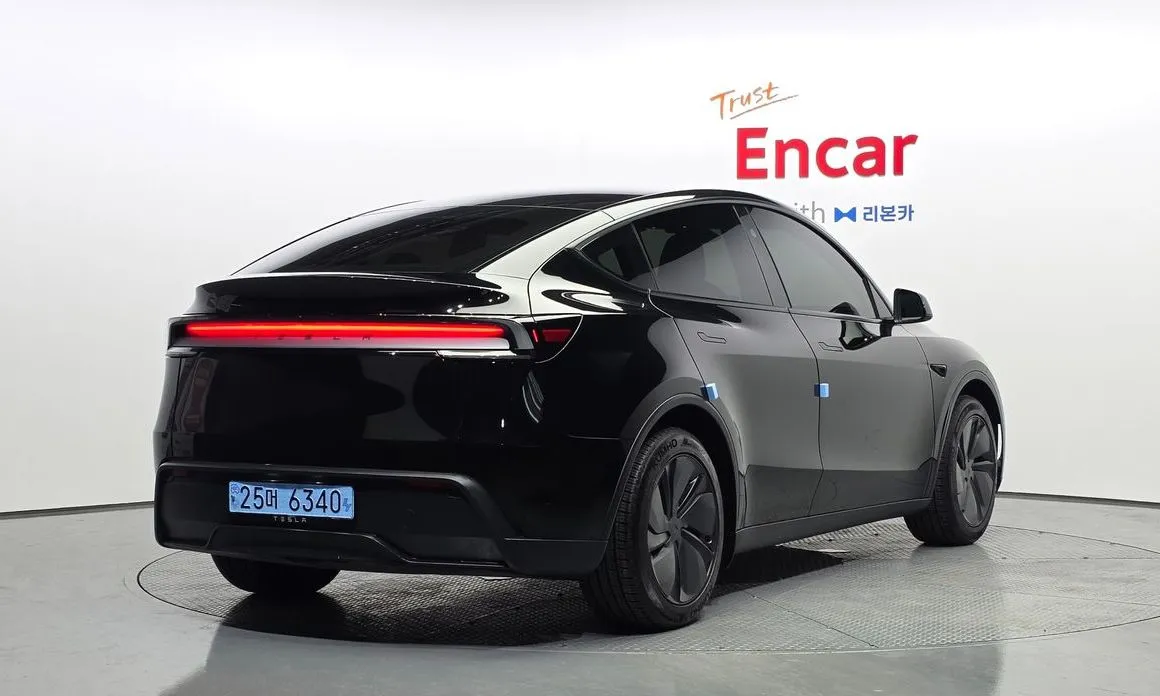 Tesla Model Y — фото 7