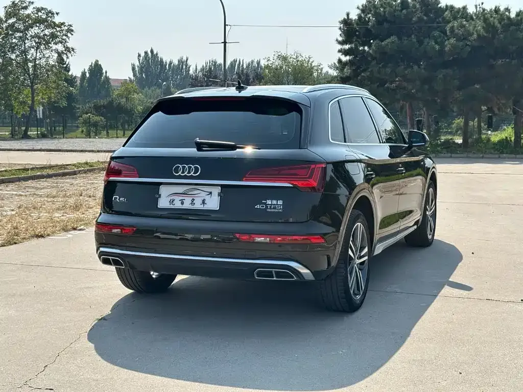 Audi Q5L — фото 9