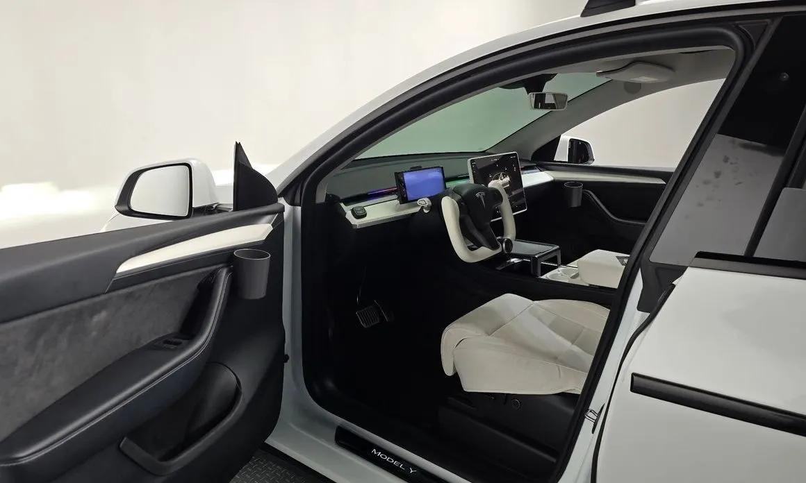 Tesla Model Y — фото 7