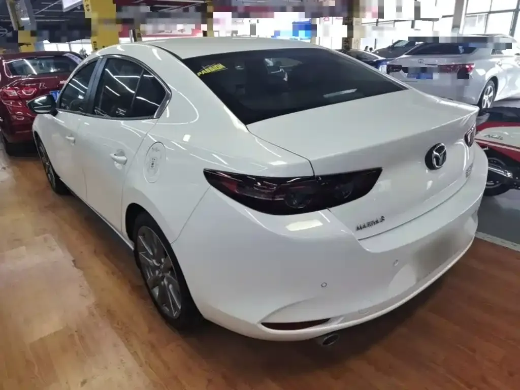 Mazda 3 Axela — фото 4
