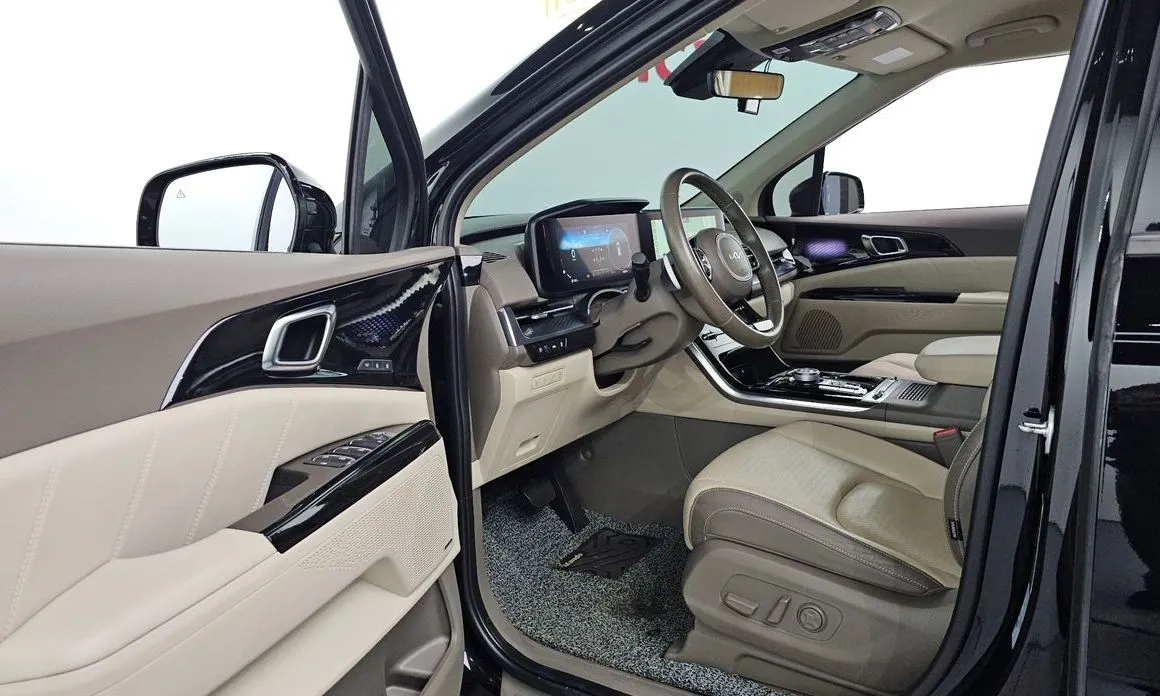 Kia Carnival — фото 10