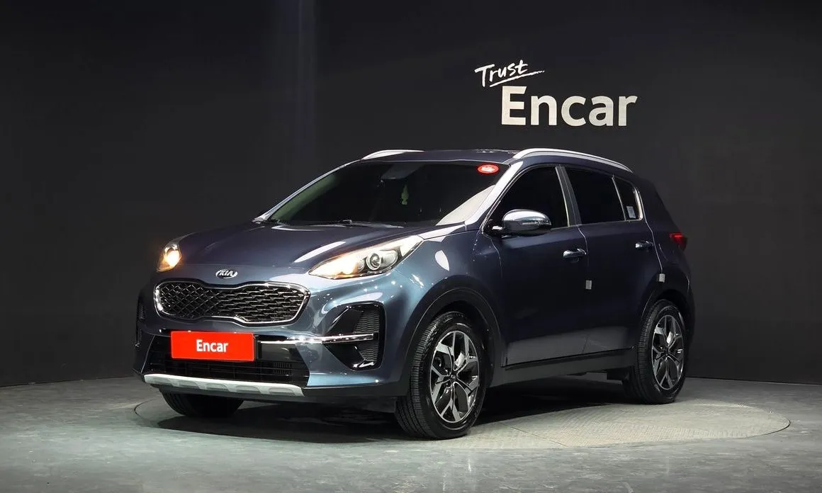 Kia Sportage — фото 1