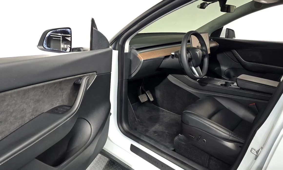 Tesla Model Y — фото 9
