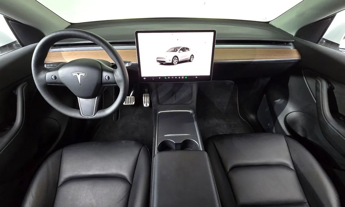 Tesla Model Y — фото 6