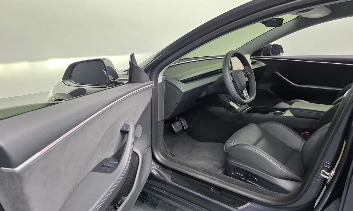 Tesla Model 3 — фото 9