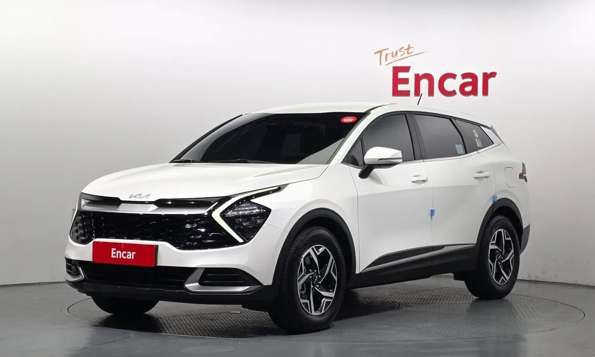 Kia Sportage — фото 1