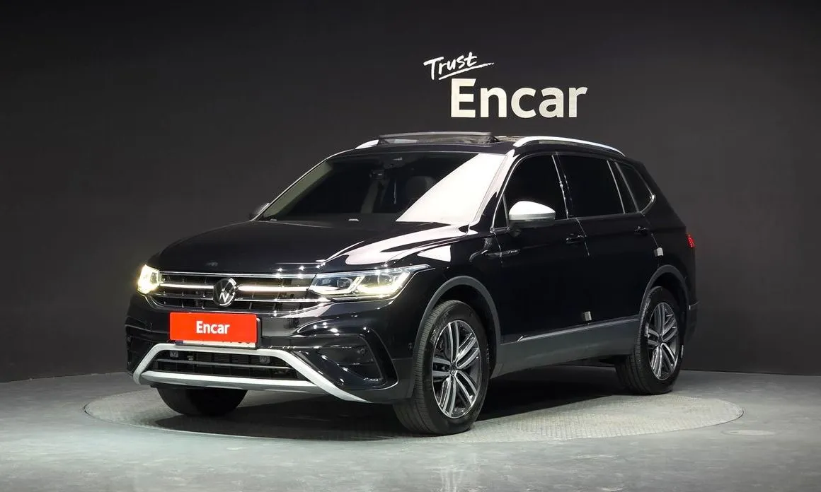 Volkswagen Tiguan — фото 1