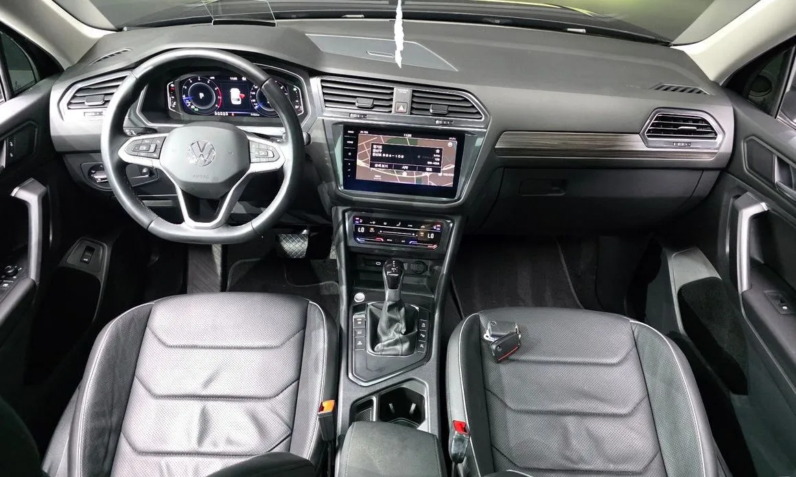 Volkswagen Tiguan — фото 10