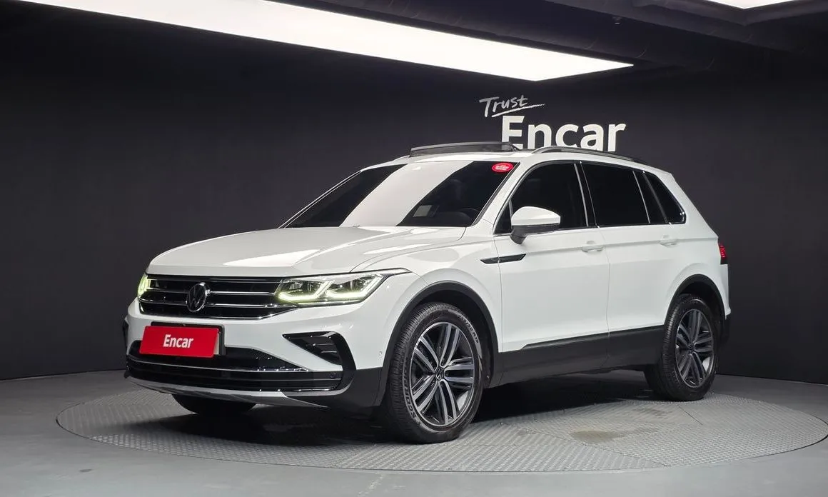 Volkswagen Tiguan — фото 1
