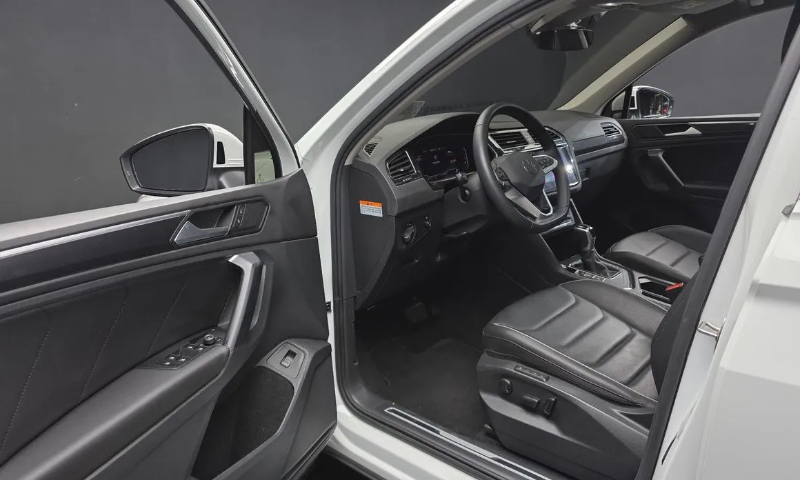 Volkswagen Tiguan — фото 7