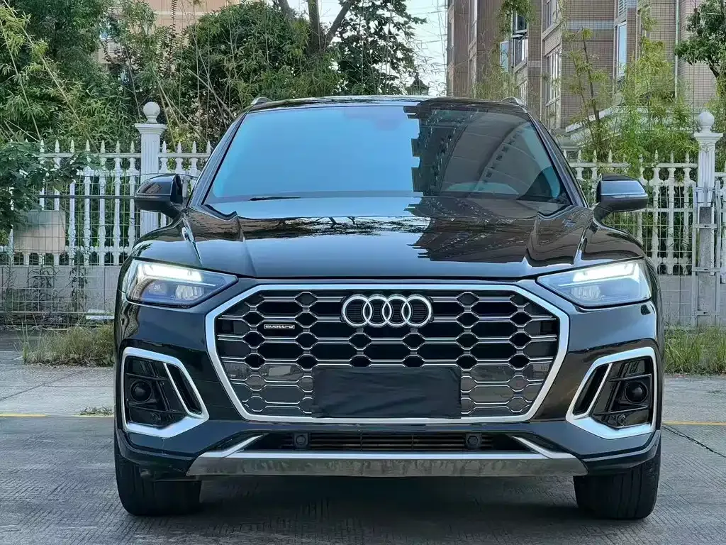 Audi Q5L — фото 6