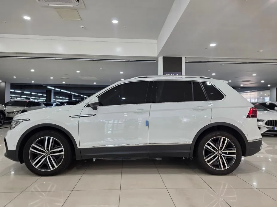 Volkswagen Tiguan — фото 6