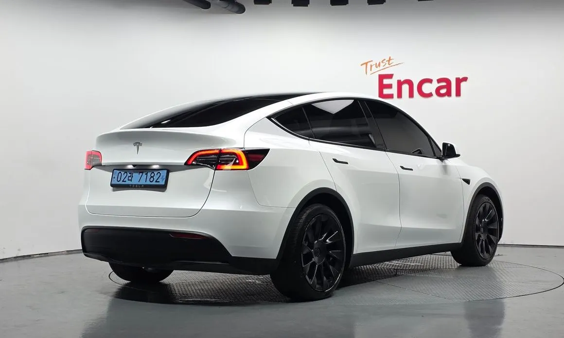 Tesla Model Y — фото 5