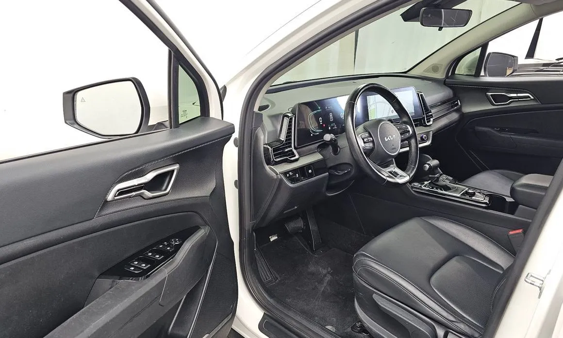 Kia Sportage — фото 5