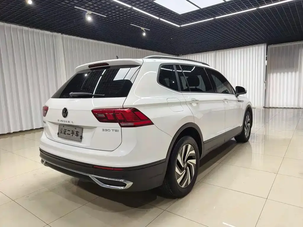 Volkswagen Tiguan L — фото 7
