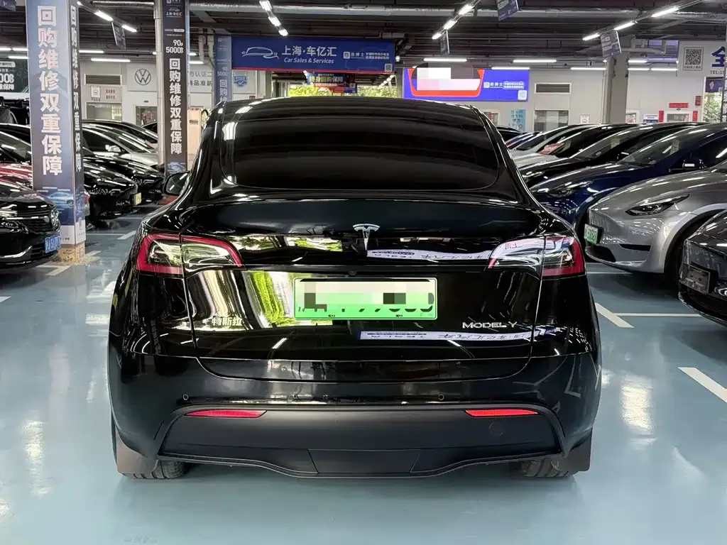 Tesla Model Y — фото 7