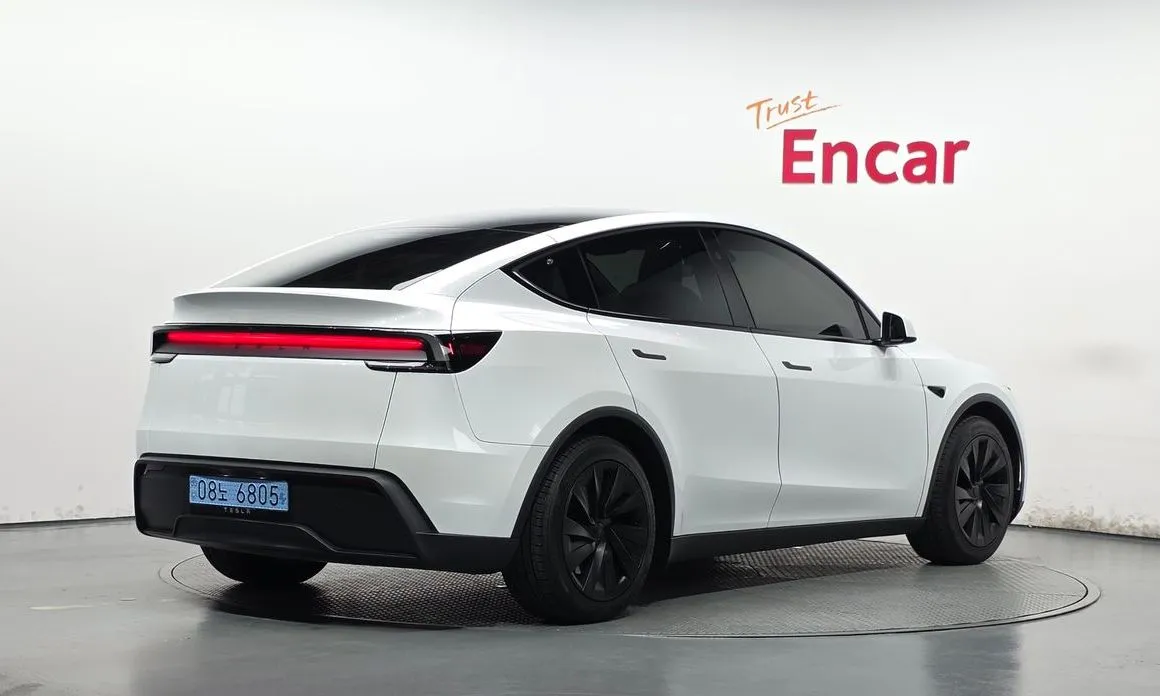 Tesla Model Y — фото 6
