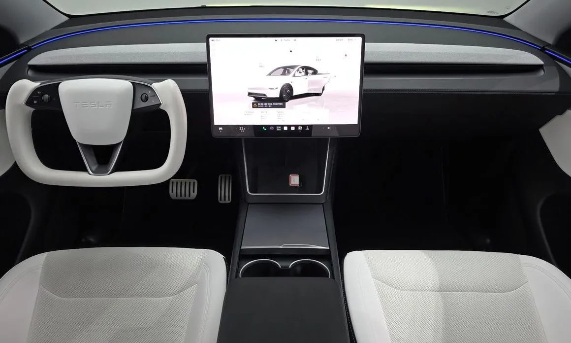 Tesla Model Y — фото 8