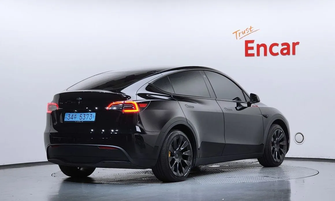 Tesla Model Y — фото 5