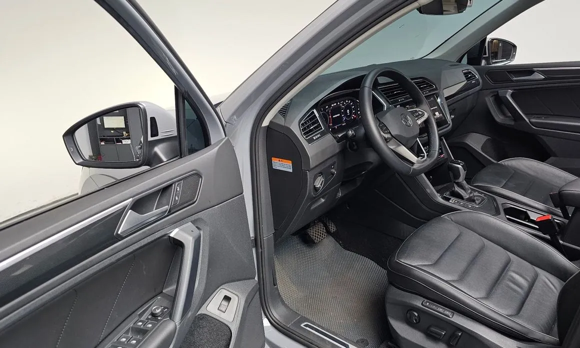 Volkswagen Tiguan — фото 9
