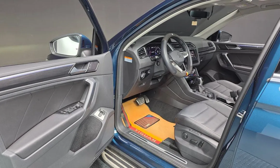Volkswagen Tiguan — фото 9