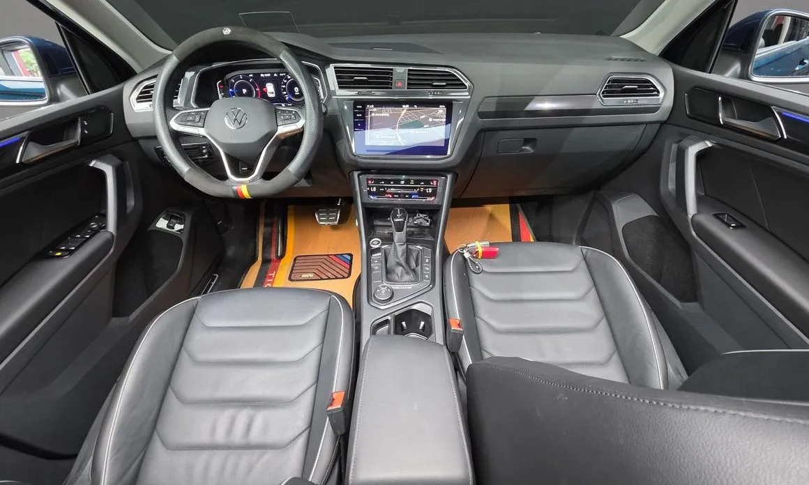 Volkswagen Tiguan — фото 6