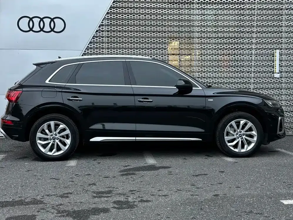 Audi Q5L — фото 8