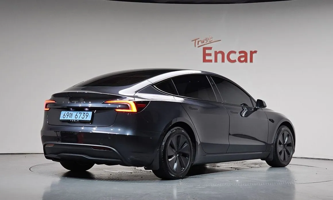 Tesla Model 3 — фото 7