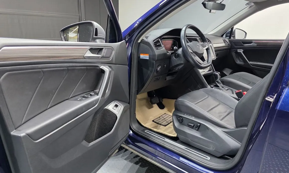 Volkswagen Tiguan — фото 10