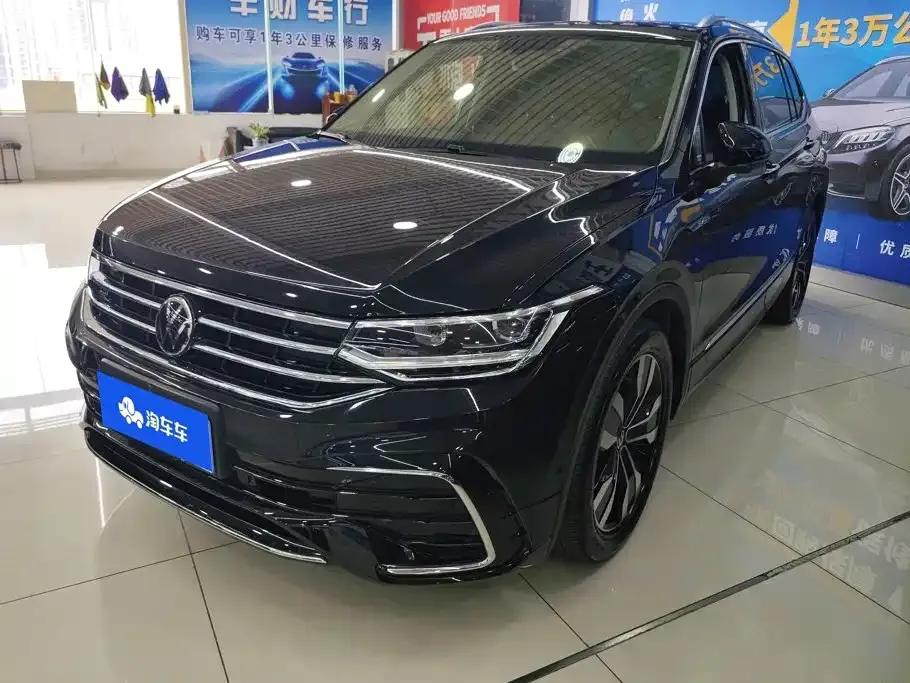 Volkswagen Tiguan L — фото 1