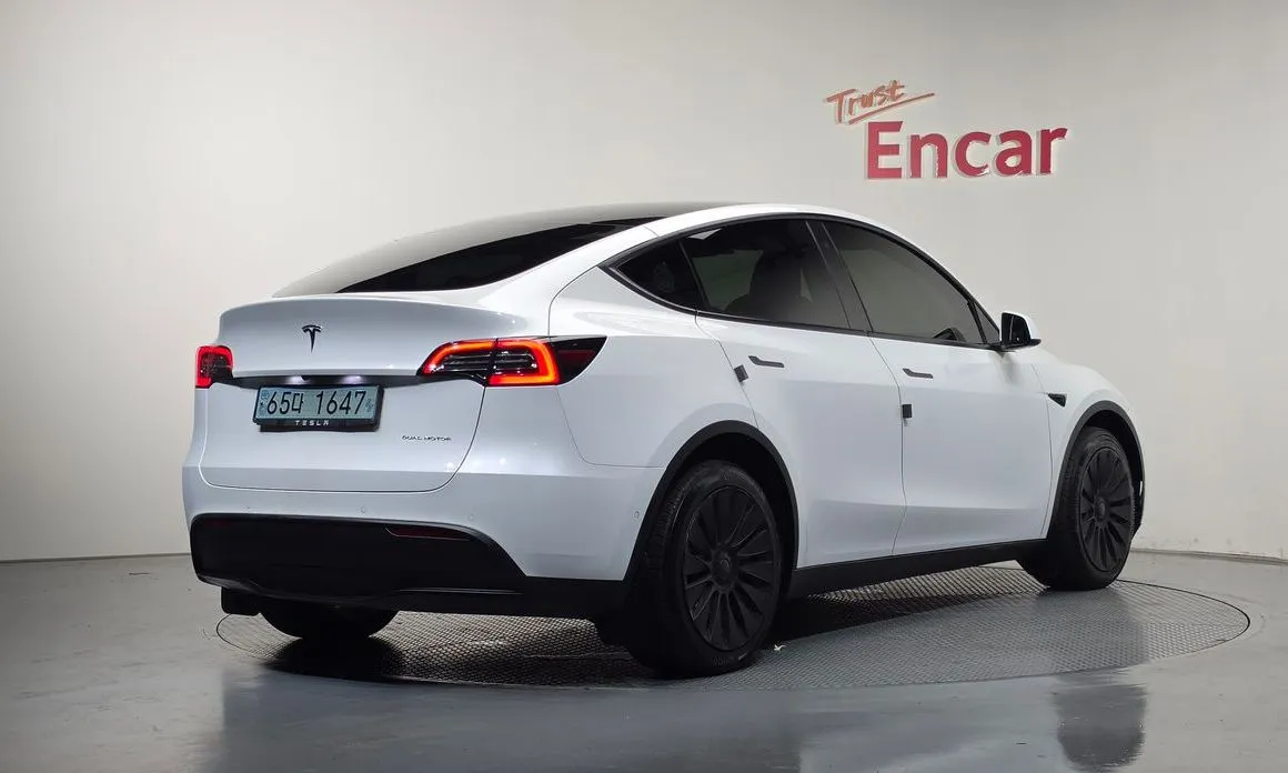 Tesla Model Y — фото 7