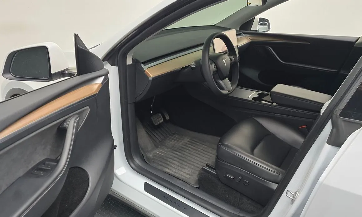 Tesla Model Y — фото 6