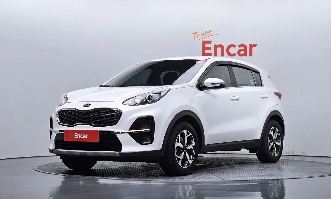 Kia Sportage — фото 1