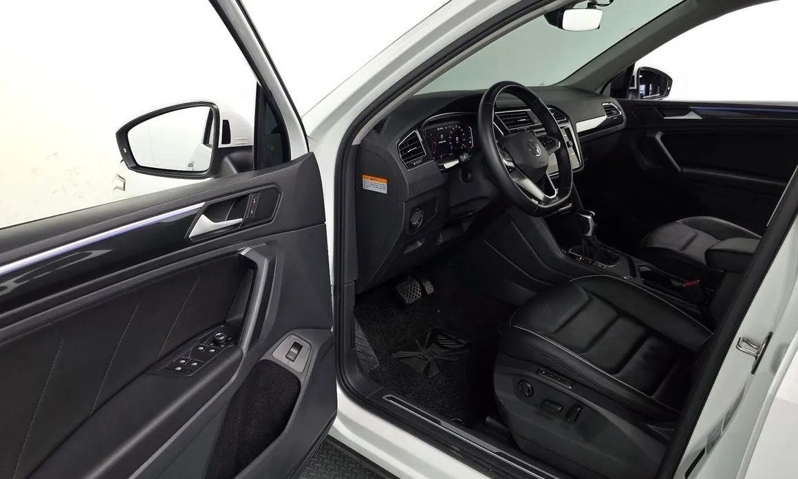 Volkswagen Tiguan — фото 7