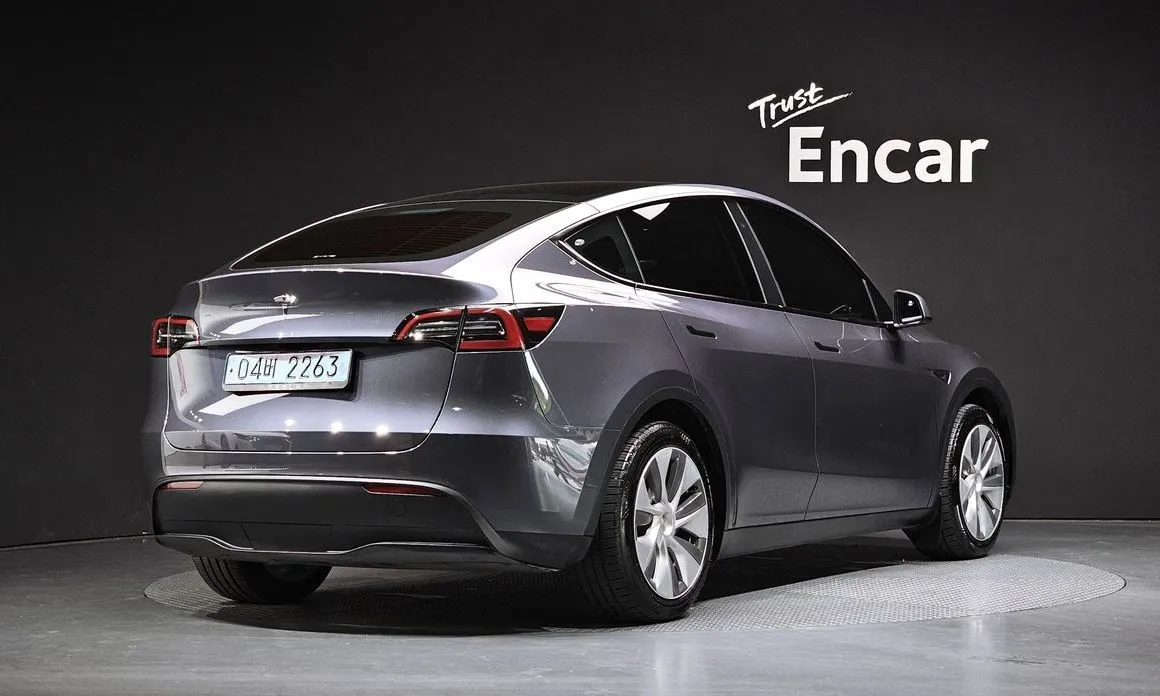 Tesla Model Y — фото 8
