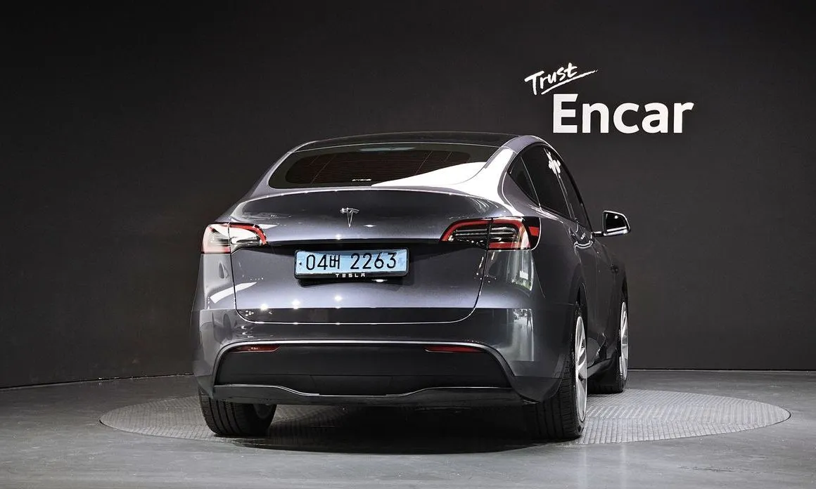 Tesla Model Y — фото 7