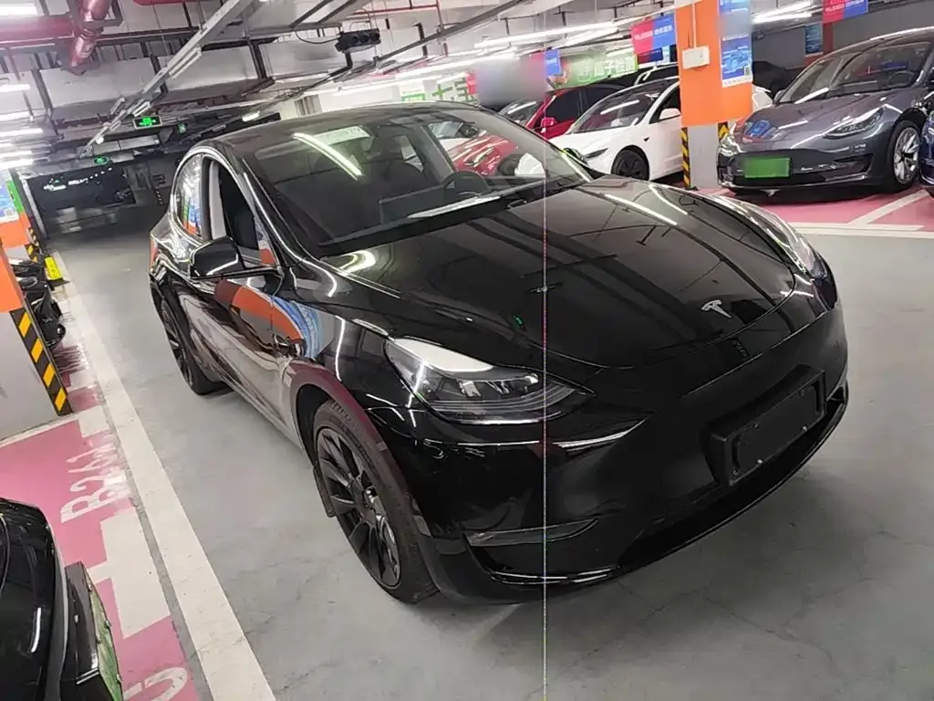 Tesla Model Y — фото 7
