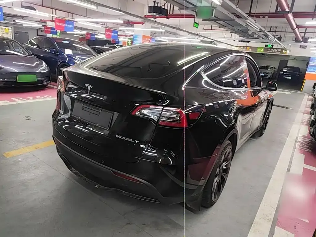 Tesla Model Y — фото 10