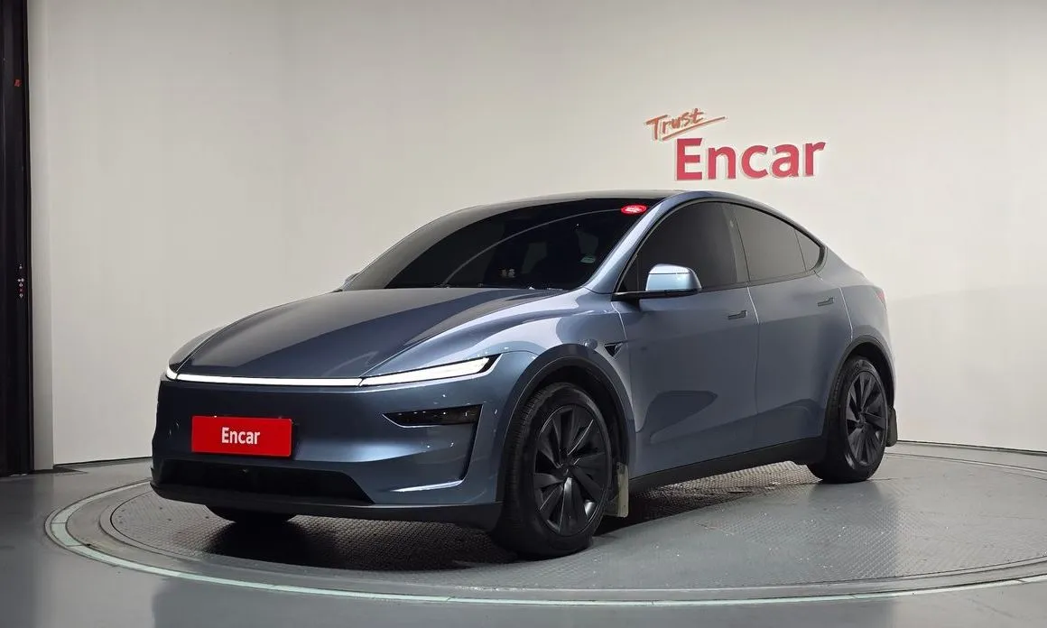 Tesla Model Y — фото 1