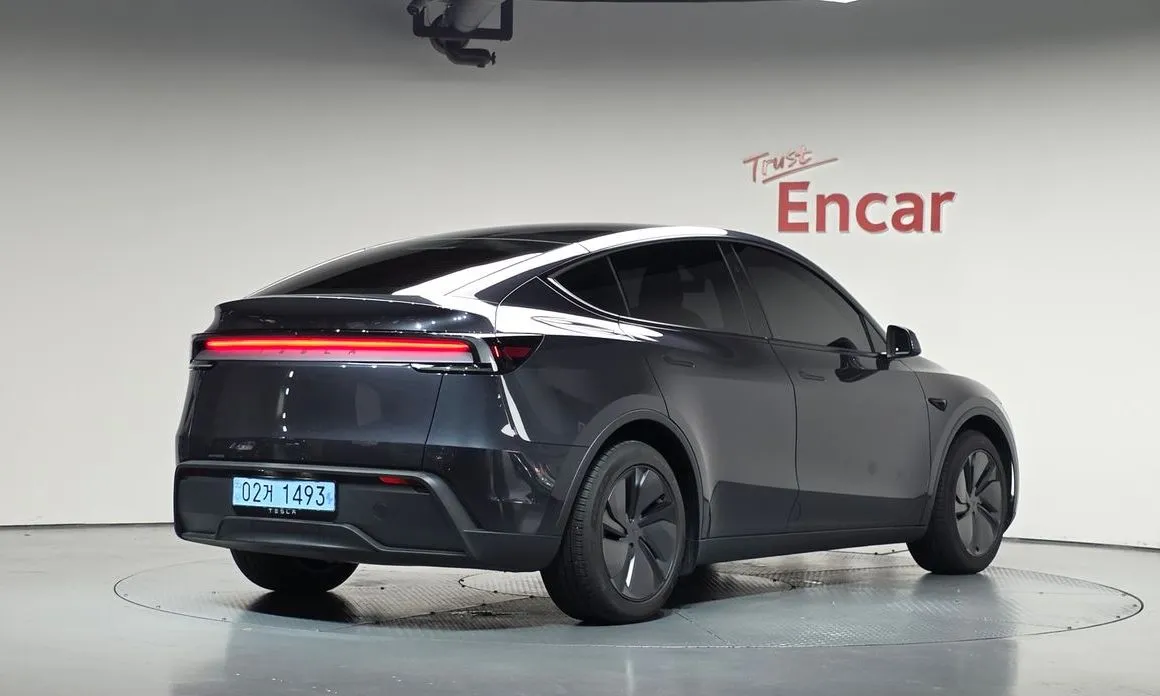 Tesla Model Y — фото 8