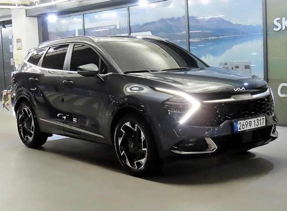 Kia Sportage — фото 1