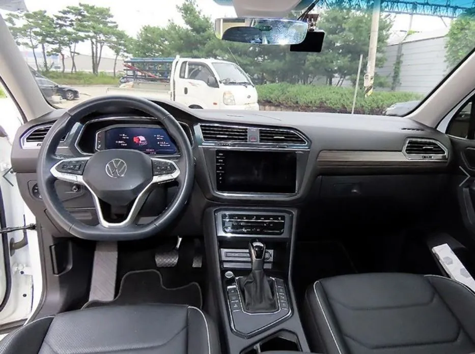 Volkswagen Tiguan — фото 10