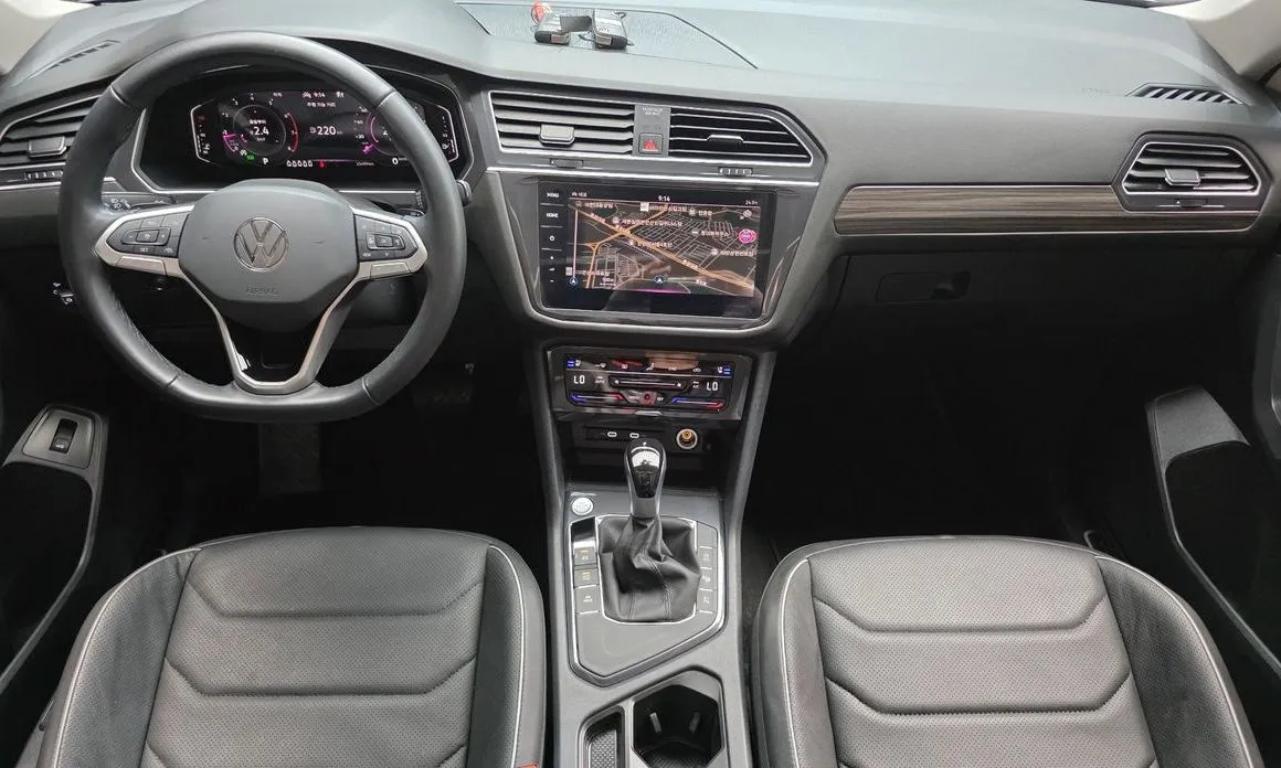 Volkswagen Tiguan — фото 7